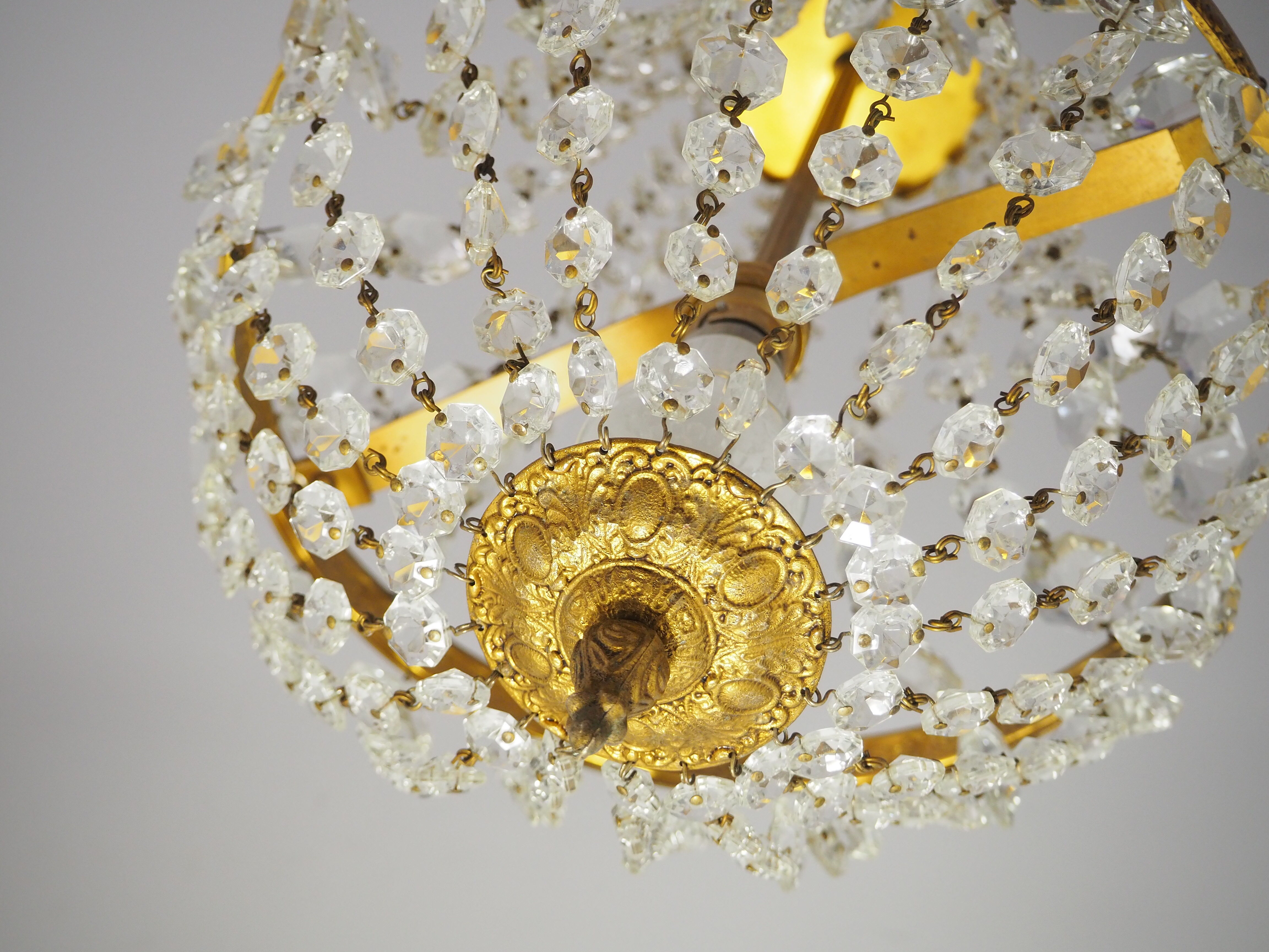 Balloon chandelier with glasses and bronze pampilles