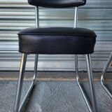 Pair of vintage black and chrome leatherette office chairs in very good condition