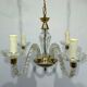 4-light glass and brass chandelier