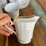 Coffee service for 6 cups, coffee pot, sugar bowl, and milk jug.