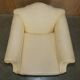 Pair of Edwardian armchairs from 1910 with carved legs and fabric.