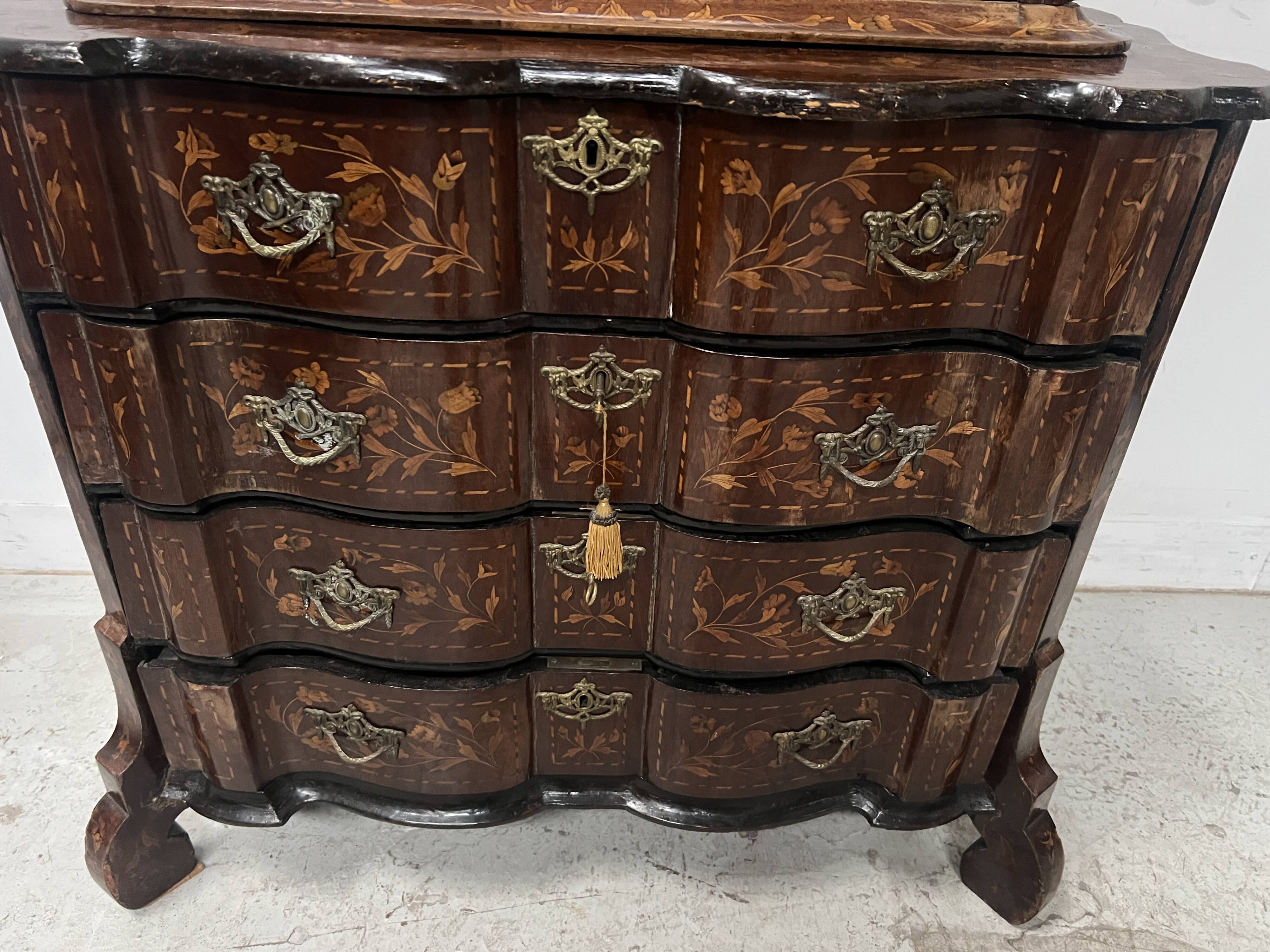 Dutch display cabinet in two parts made of marquetry wood.
