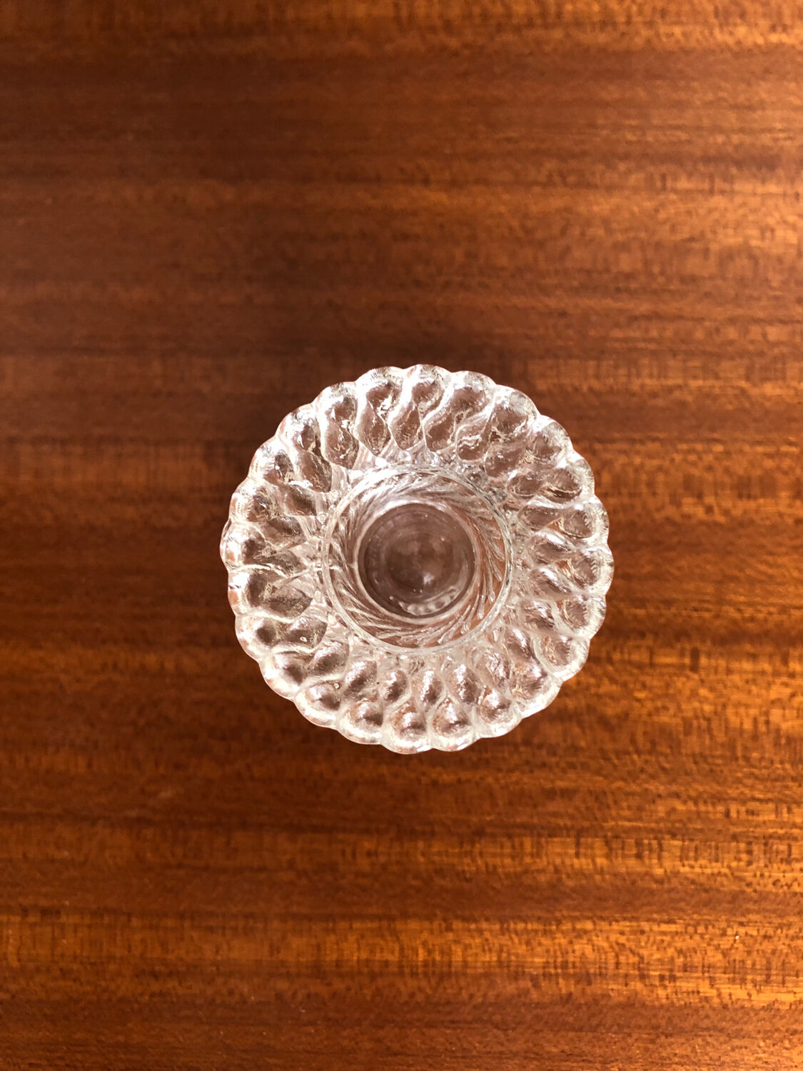 Old pair of vintage round molded glass candle holder