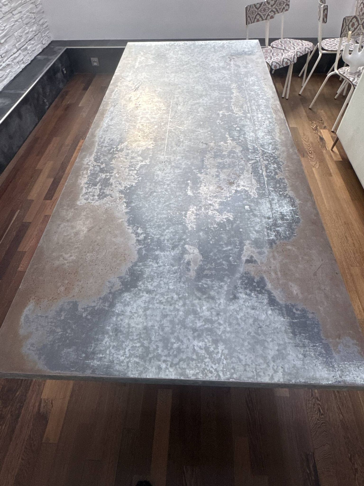 Patinated steel table