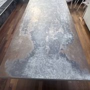 Patinated steel table