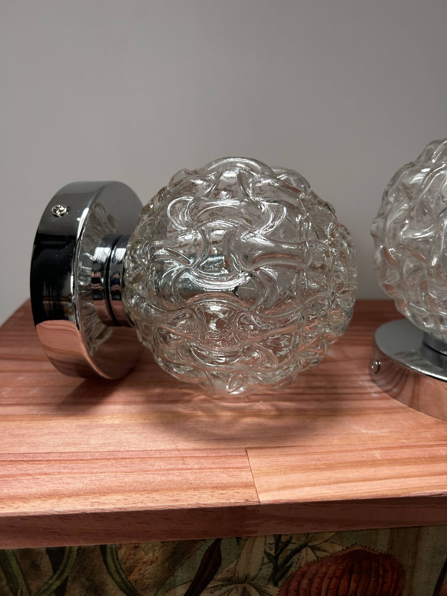 Pair of vintage glass globe chrome wall lights