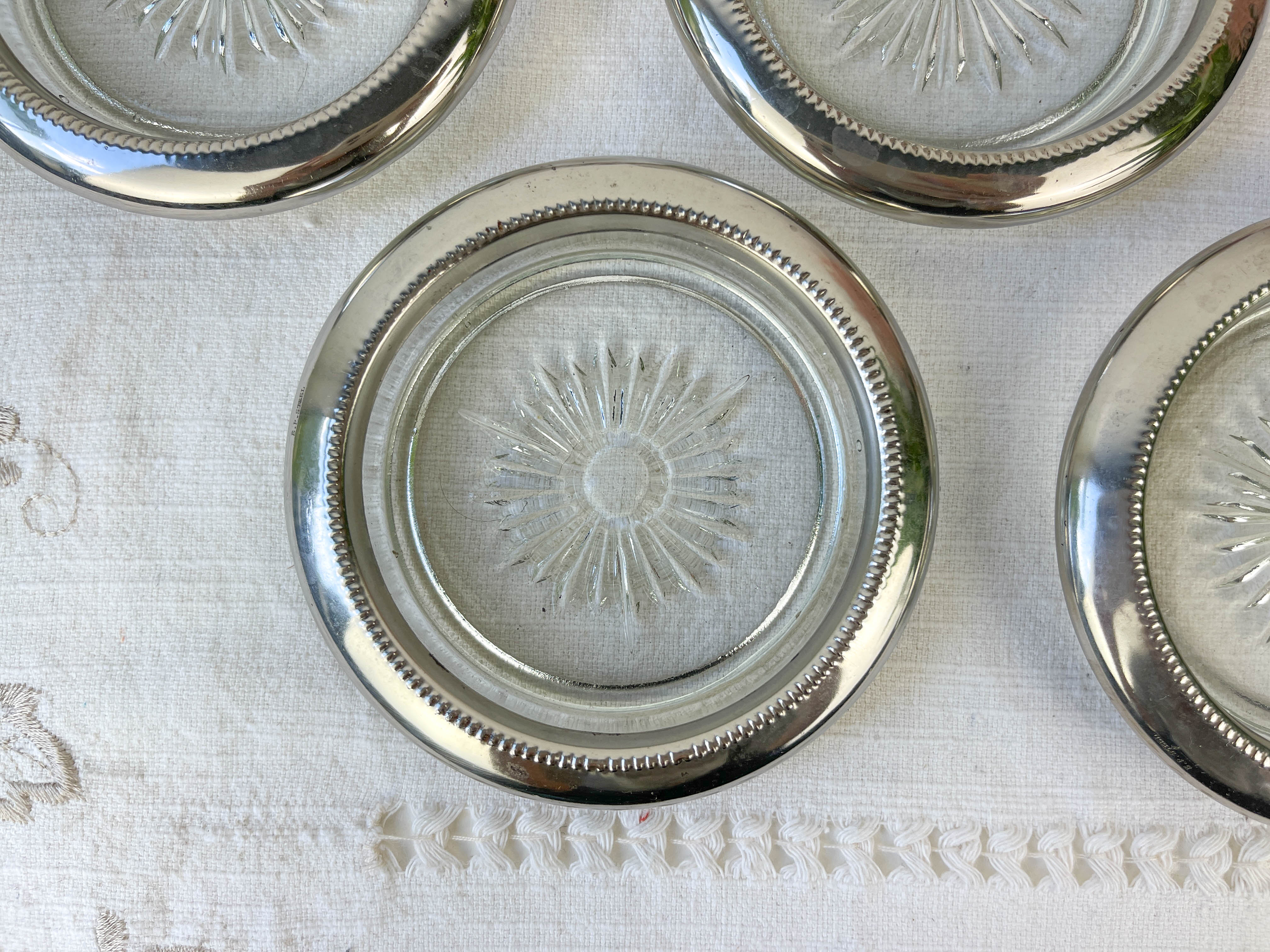 4 vintage glass coasters in glass and silver metal Leonard Silverplate style