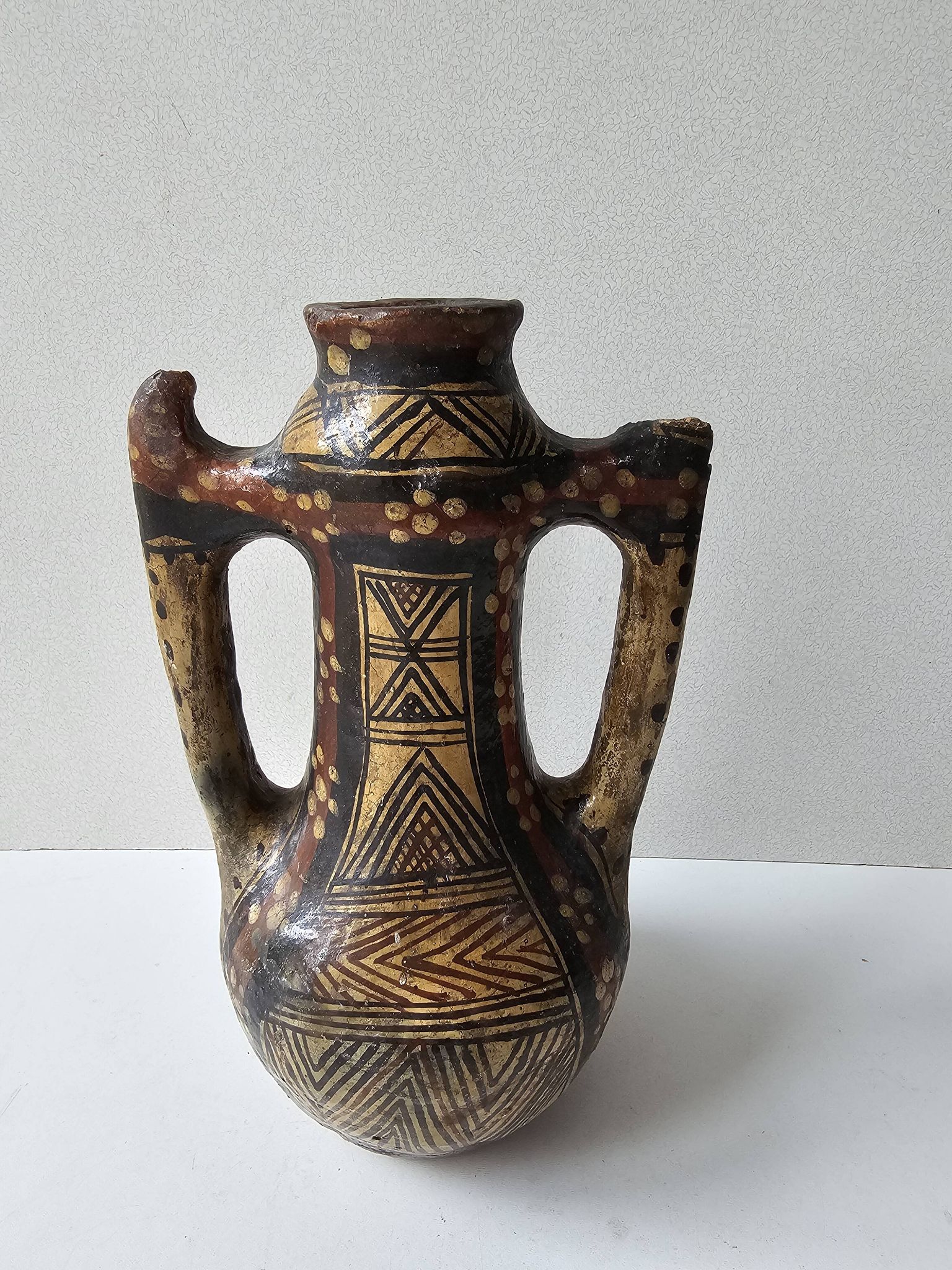 Kabyle Algerian pottery oil jar with polychrome geometric decorations