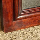 Large antique mirror in a flame mahogany frame; 132x82 cm