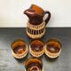 Carafe juice service with 4 orange blown glass glasses + vintage wicker