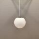 White hanging lamp with metal suspension, made with ball round opal glass shade.