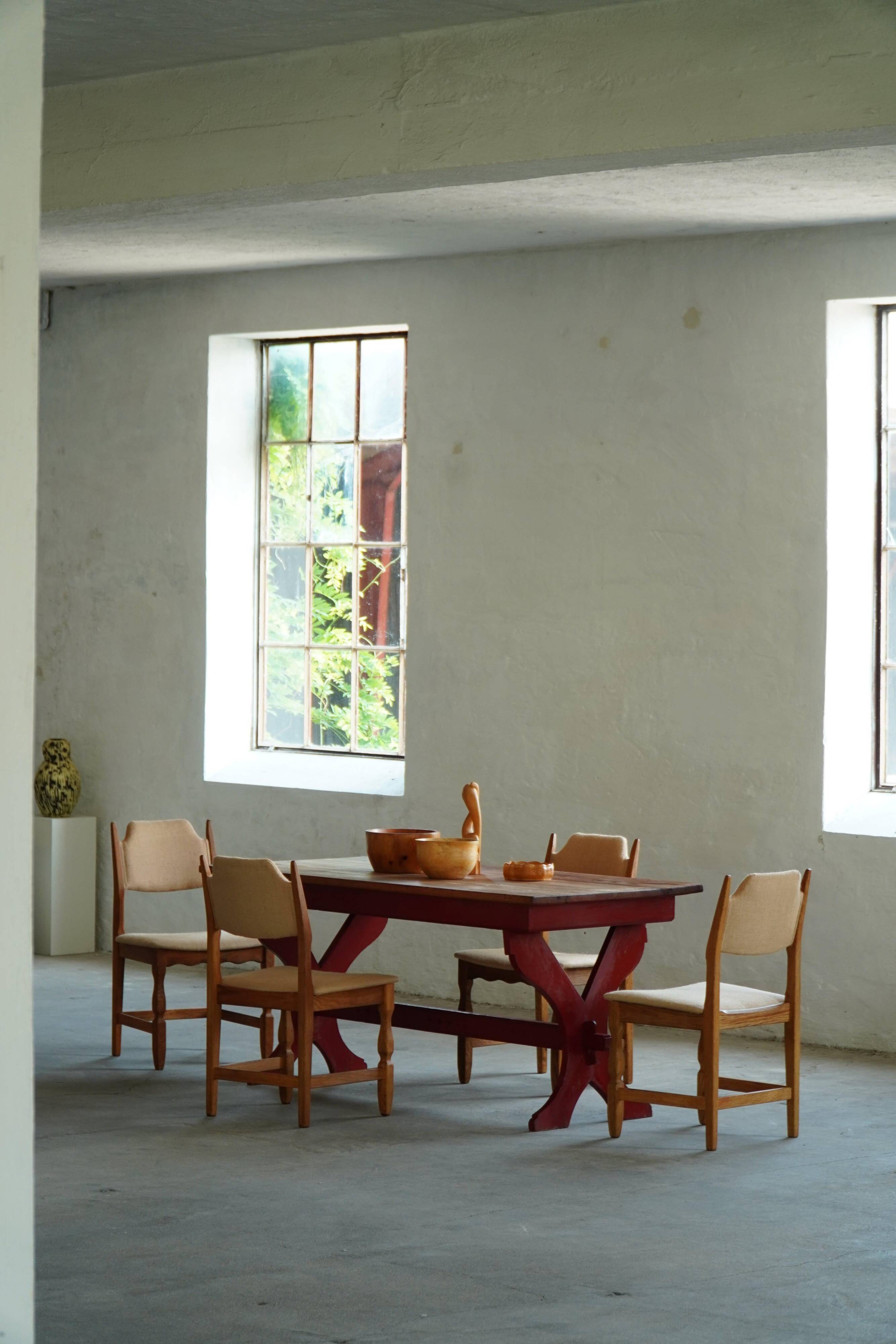 Rustic farmhouse dining table in painted red pine, Sweden, 1920s.