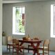 Rustic farmhouse dining table in painted red pine, Sweden, 1920s.