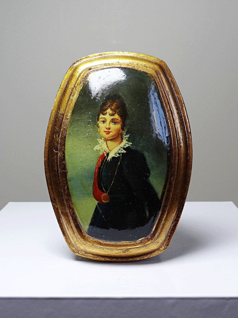 Small vintage Venetian oil on wood convex medallion portrait.