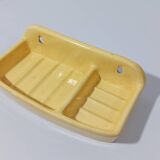 Pale yellow ceramic soap dish