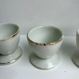 Trio of white shells bordered gold 50s