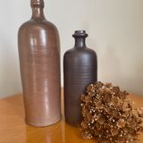 Pair of brown stoneware bottles