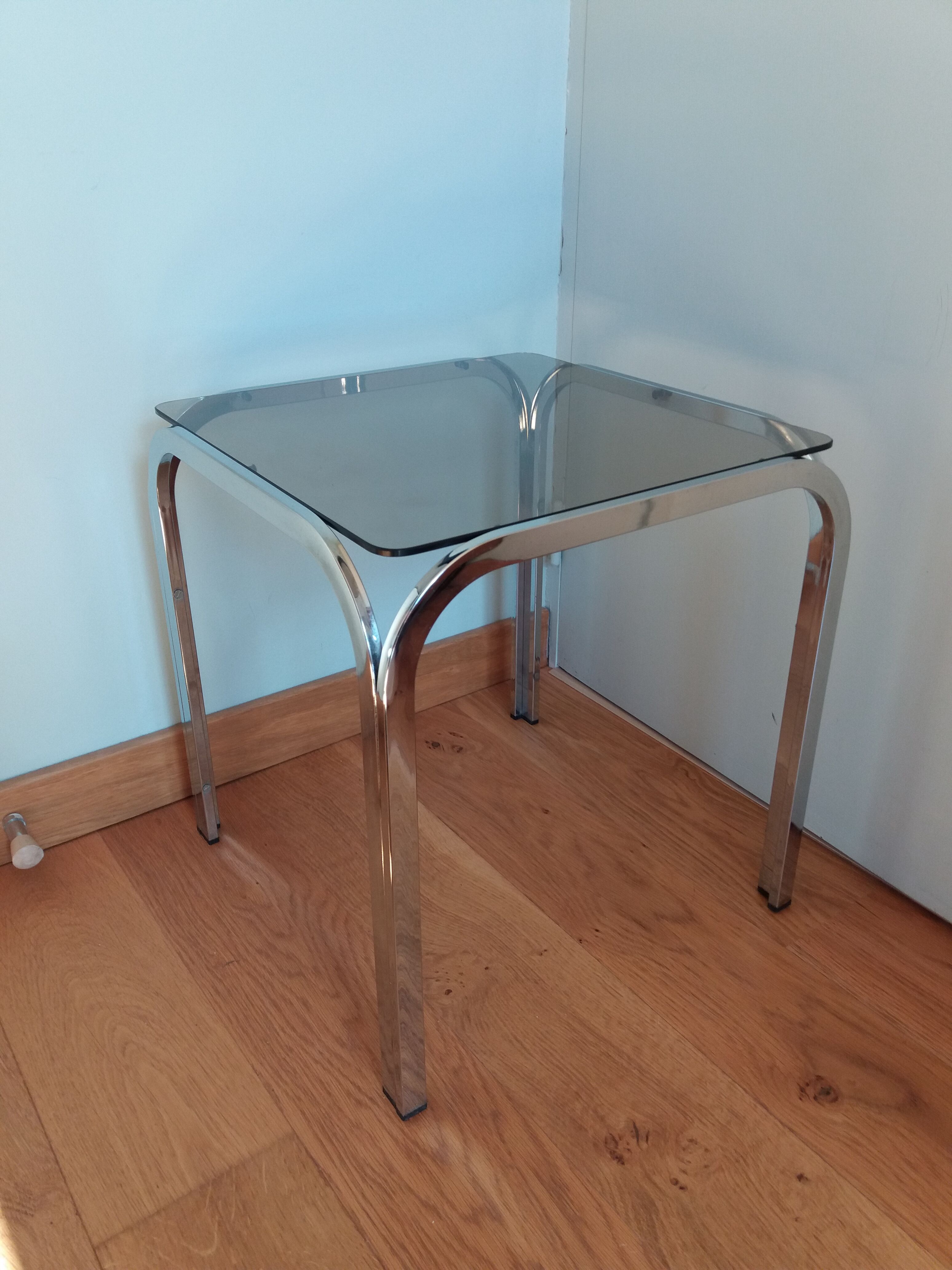 Square coffee table in chromed metal and smoked glass