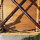 Wicker or rattan armchairs and bamboo