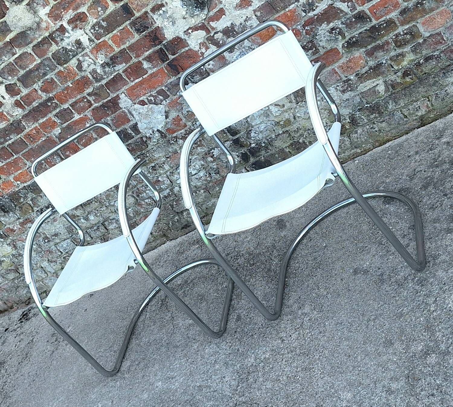 Pair of vintage tubular armchairs, designer seating furniture