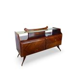 midcentury rosewood chest of drawers.