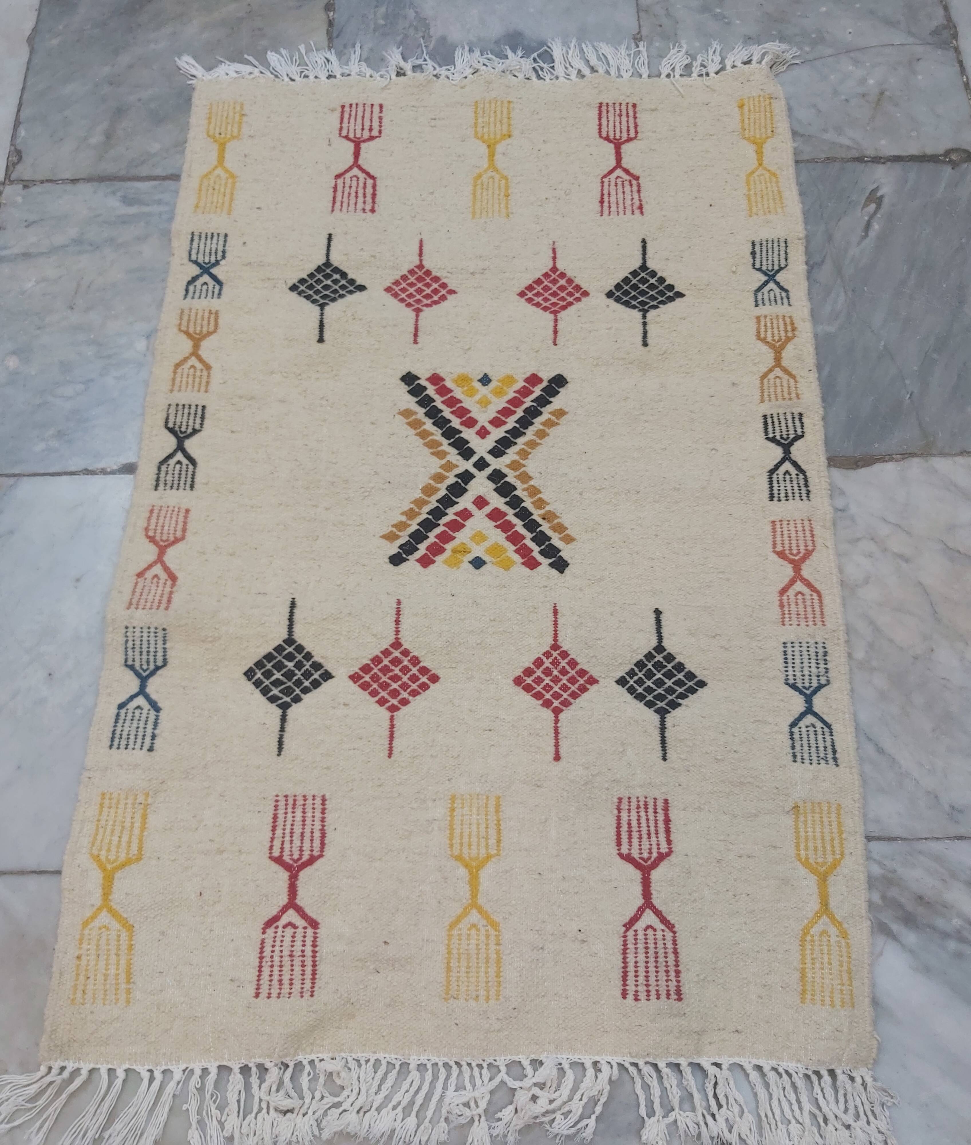 Traditional handmade carpet 112x72cm