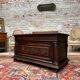 Chest in carved natural wood of the eighteenth century