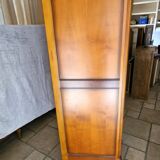 Wooden style wardrobe, 3 doors and 9 internal shelves.