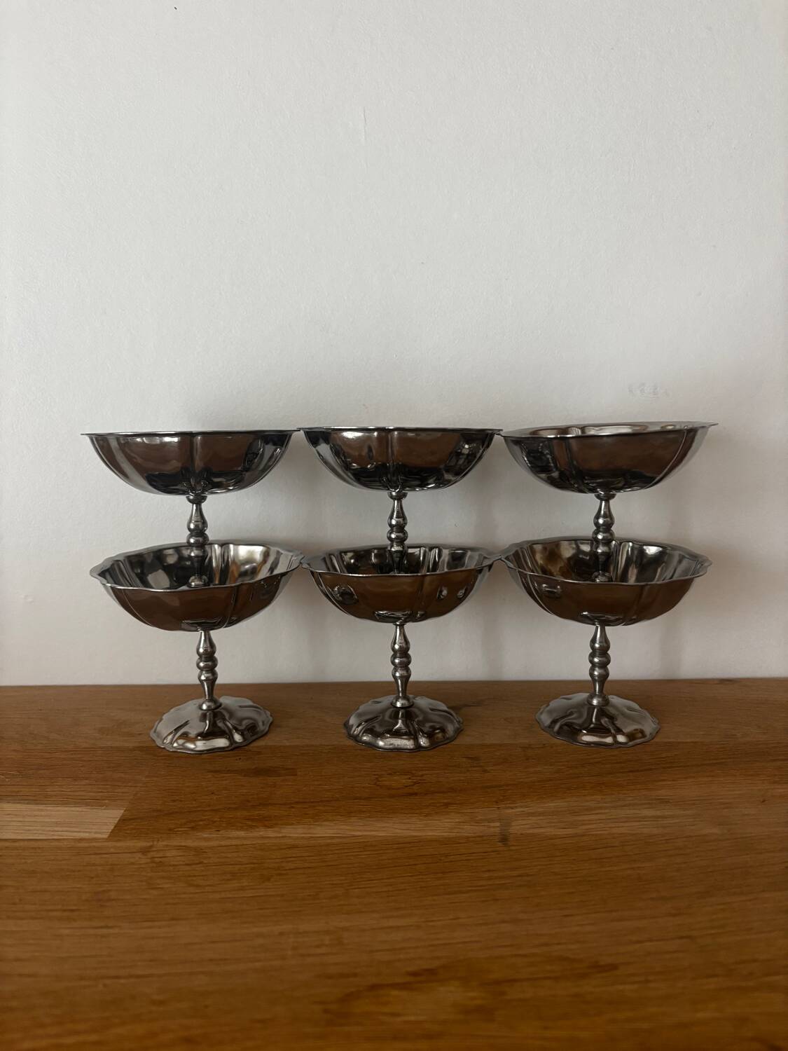 Vintage set of 6 finely engraved stainless steel bowls.