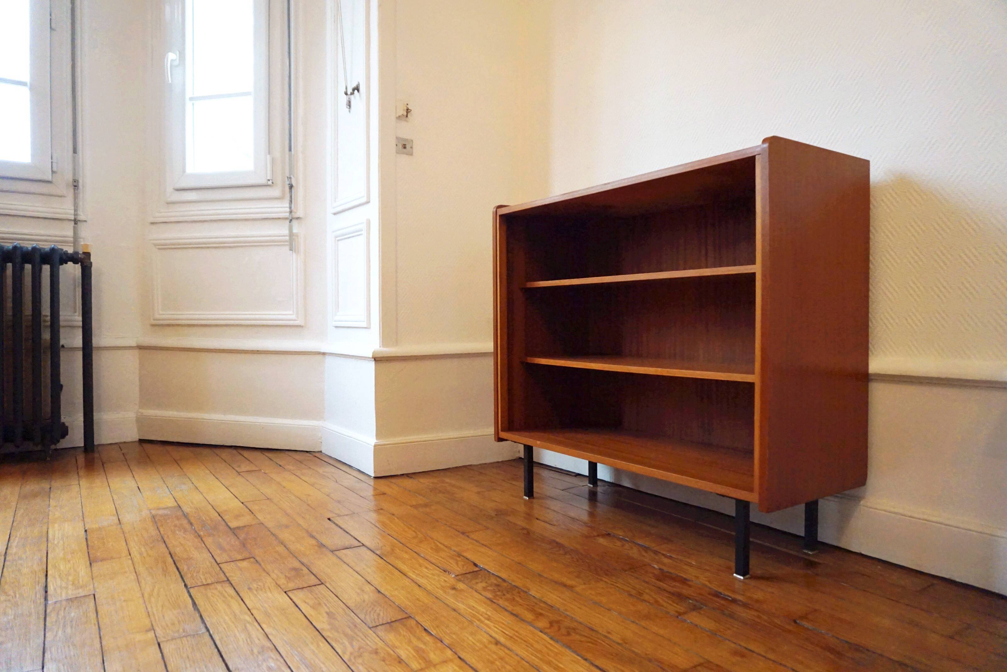 Vintage bookcase with metal feet