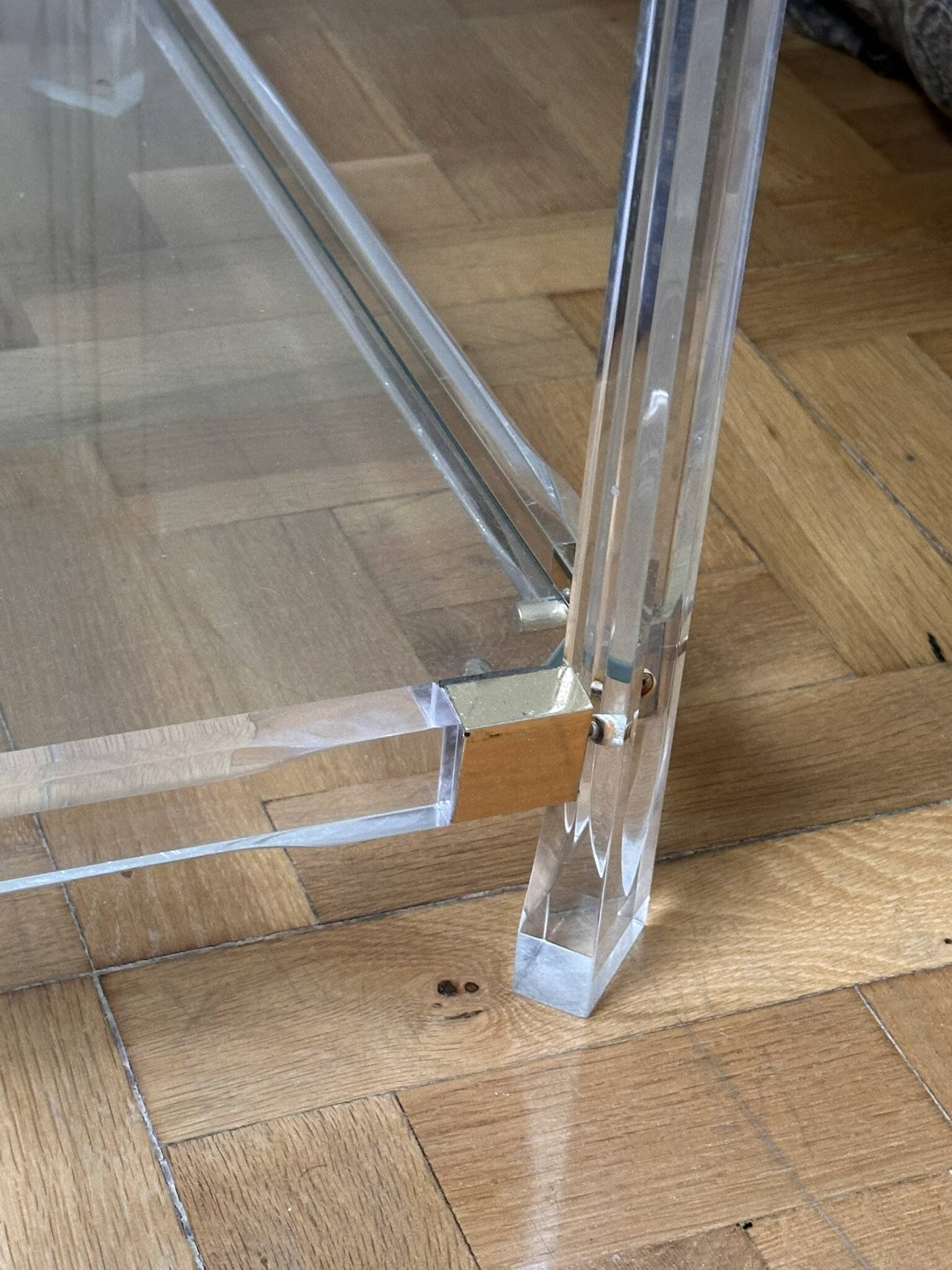 2 side tables in plexiglass, glass, and brass.