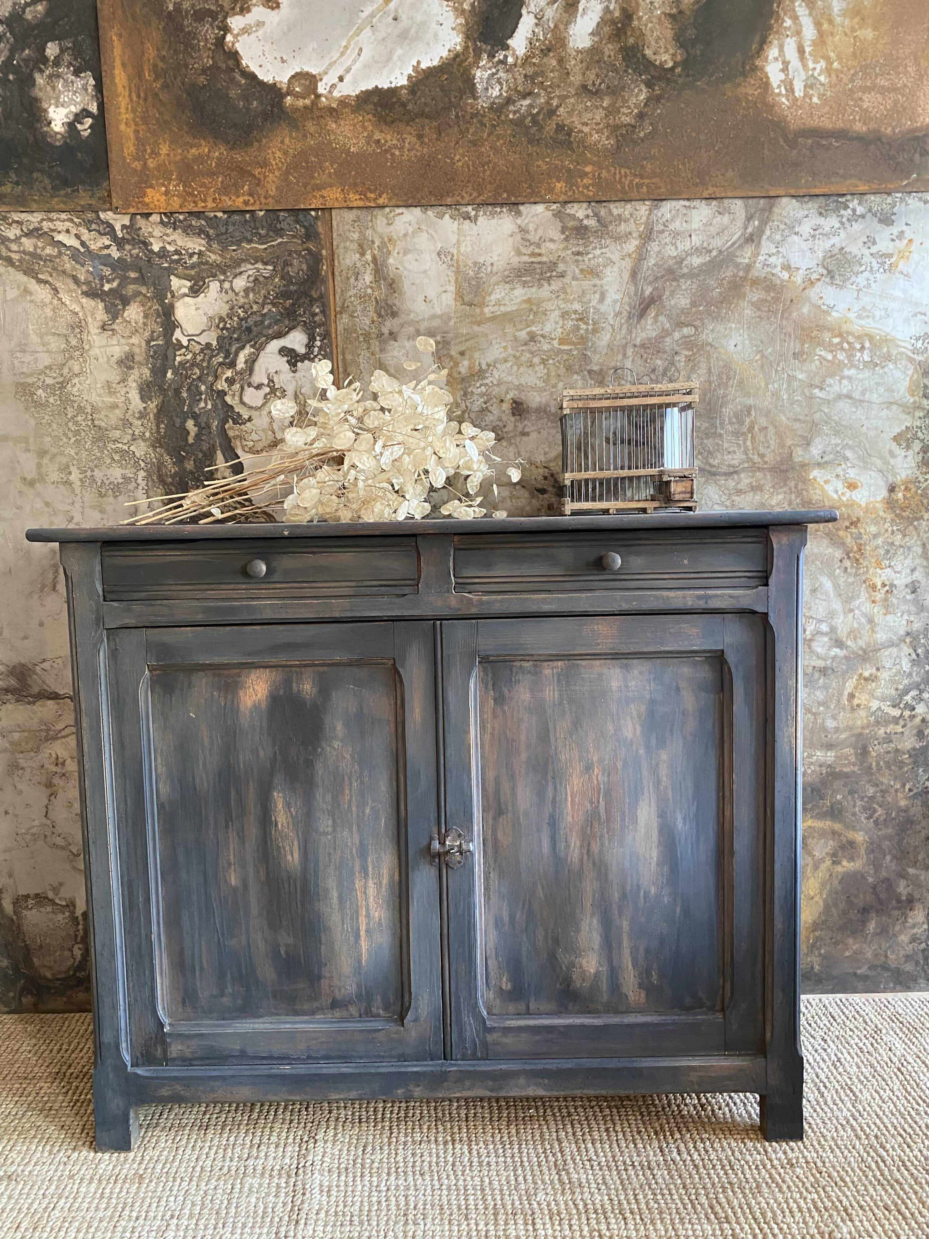 Parisian buffet in its blackened patina