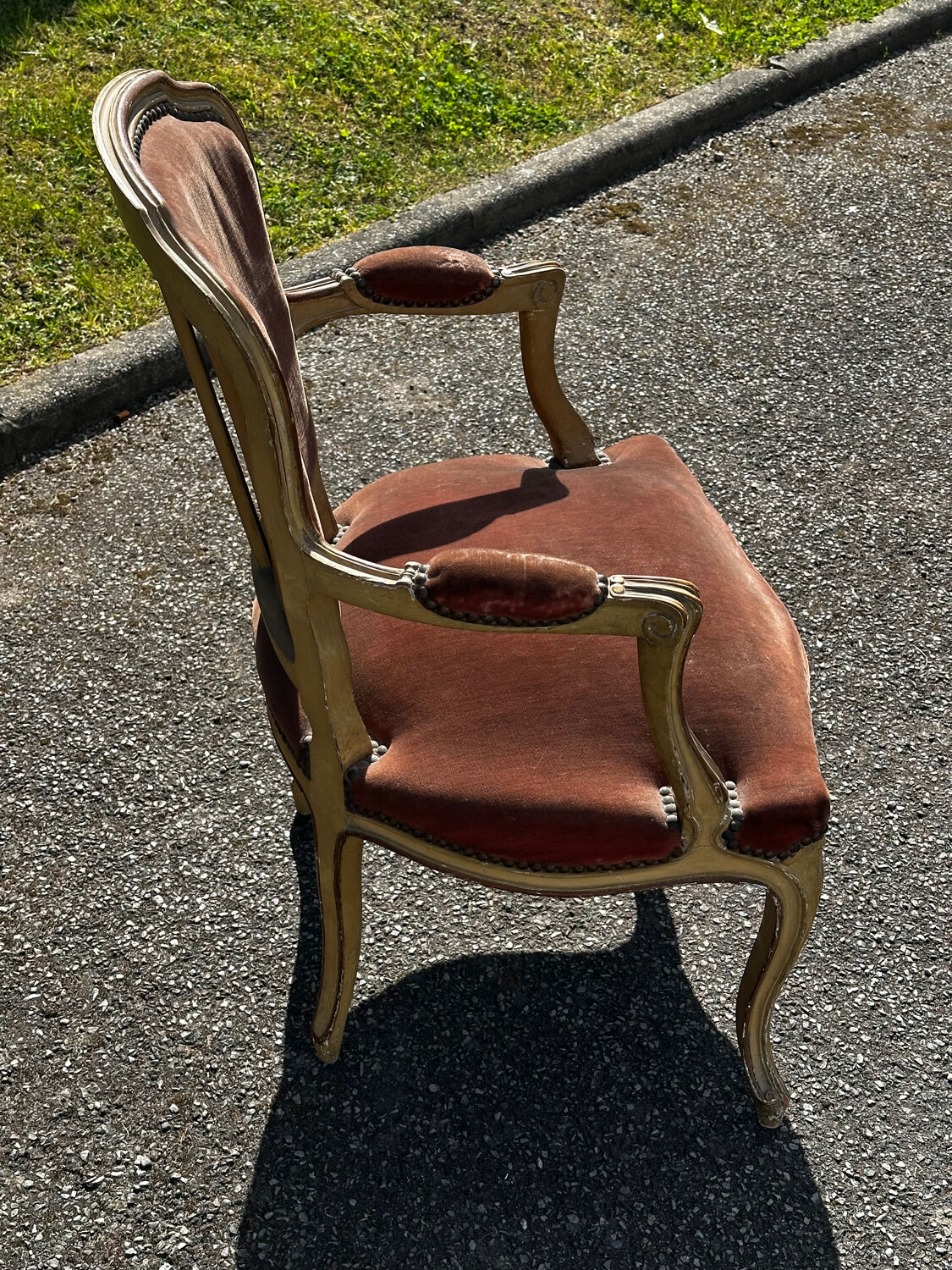 Louis XV cabriolet armchair, patinated wood and antique velvet.