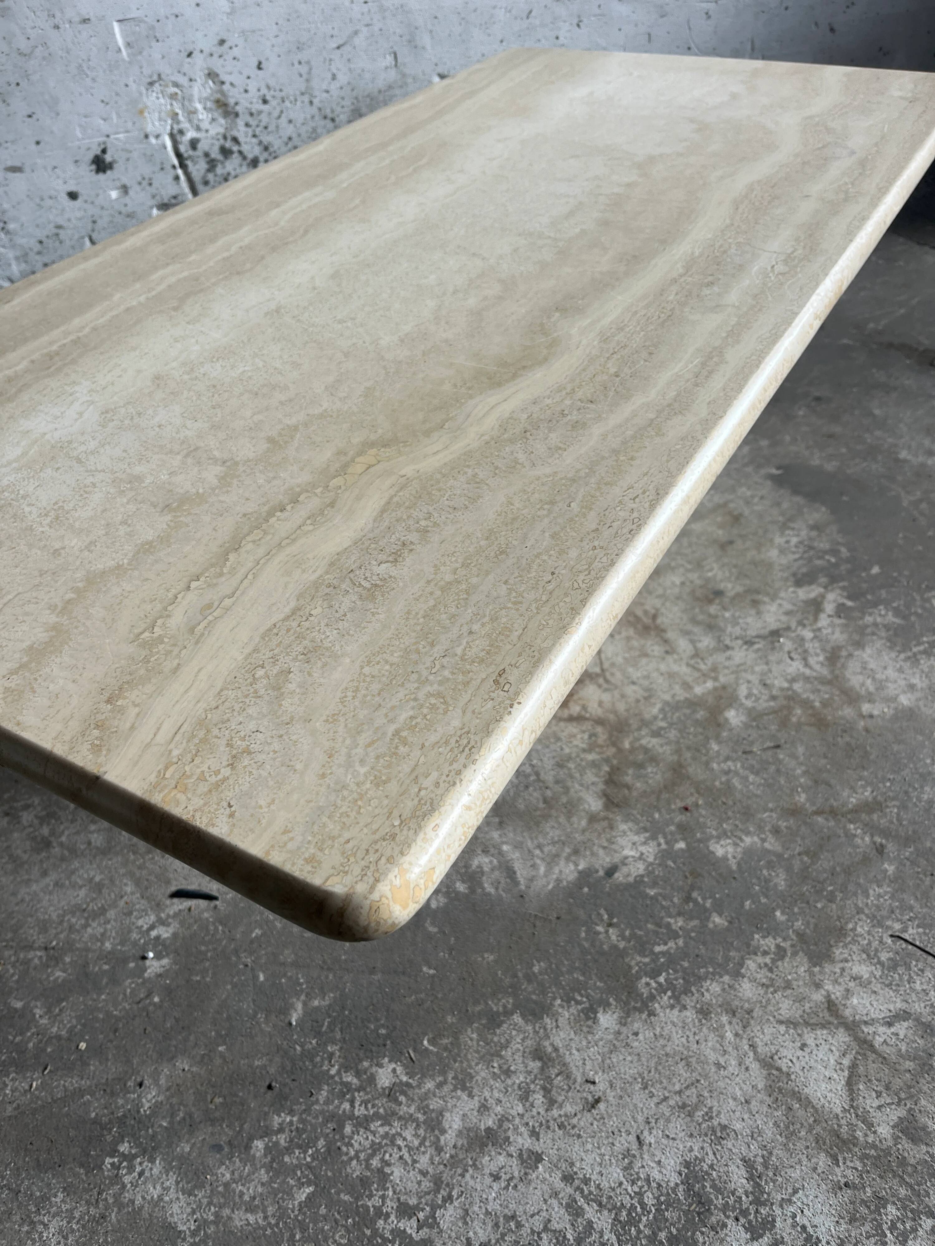 Italian coffee table in travertine – 1970s
