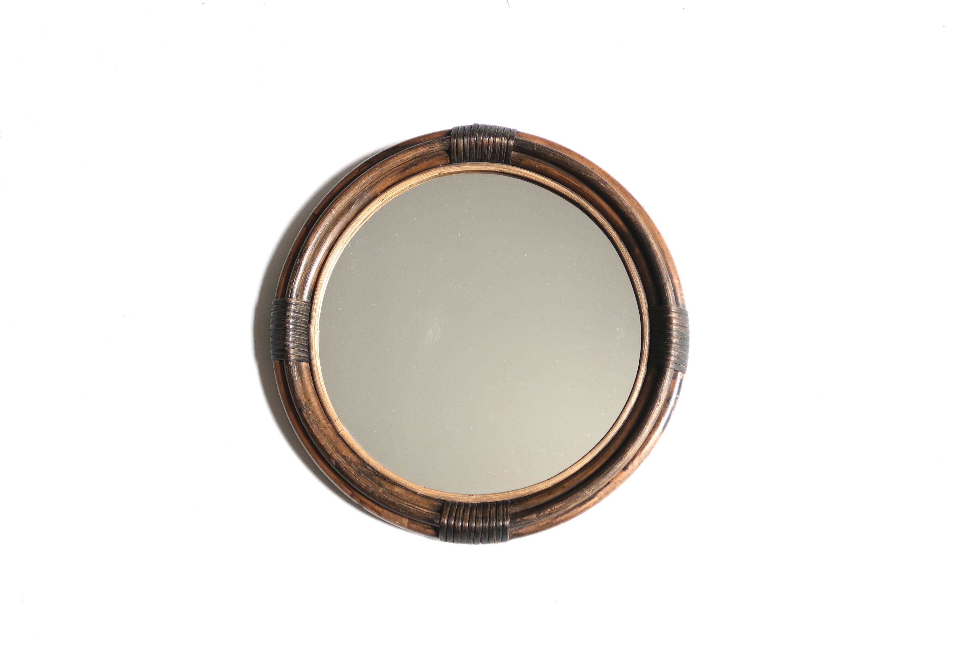 Round mirror in dark rattan, 50s