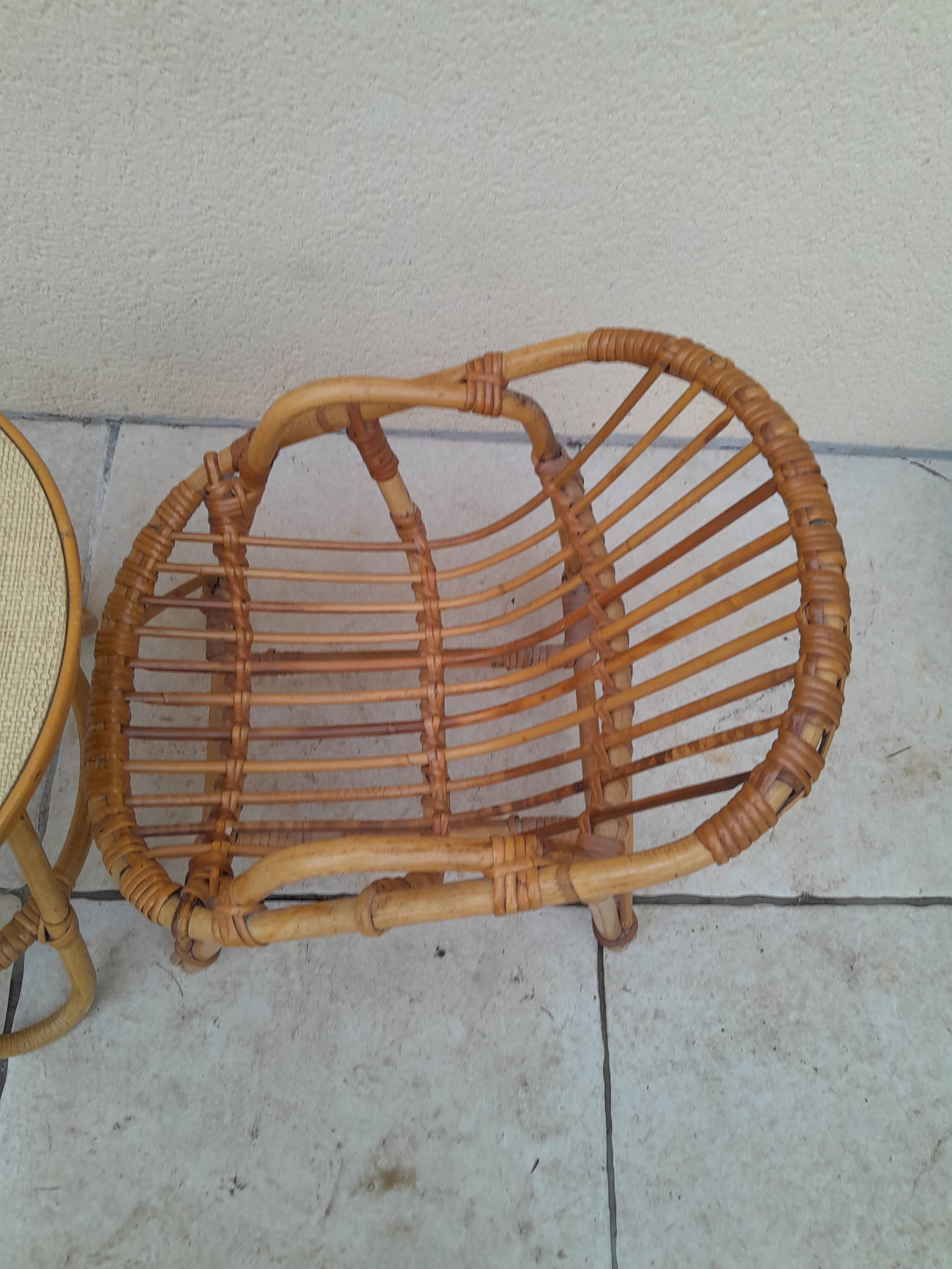 Vintage rattan children's table and armchair