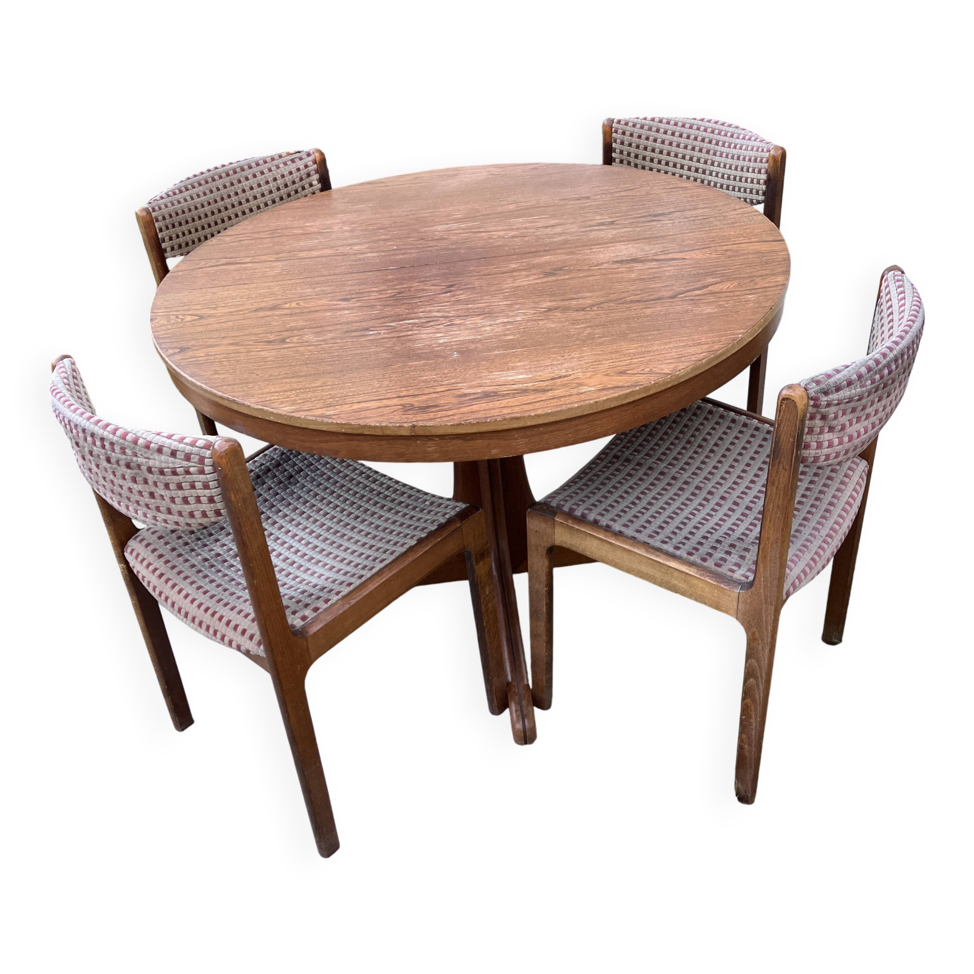 Extendable round dining table and 4 Baumann chairs.