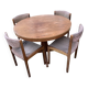 Extendable round dining table and 4 Baumann chairs.