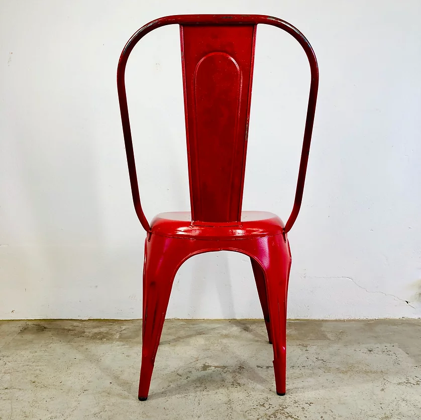 Set of four low chairs in red steel