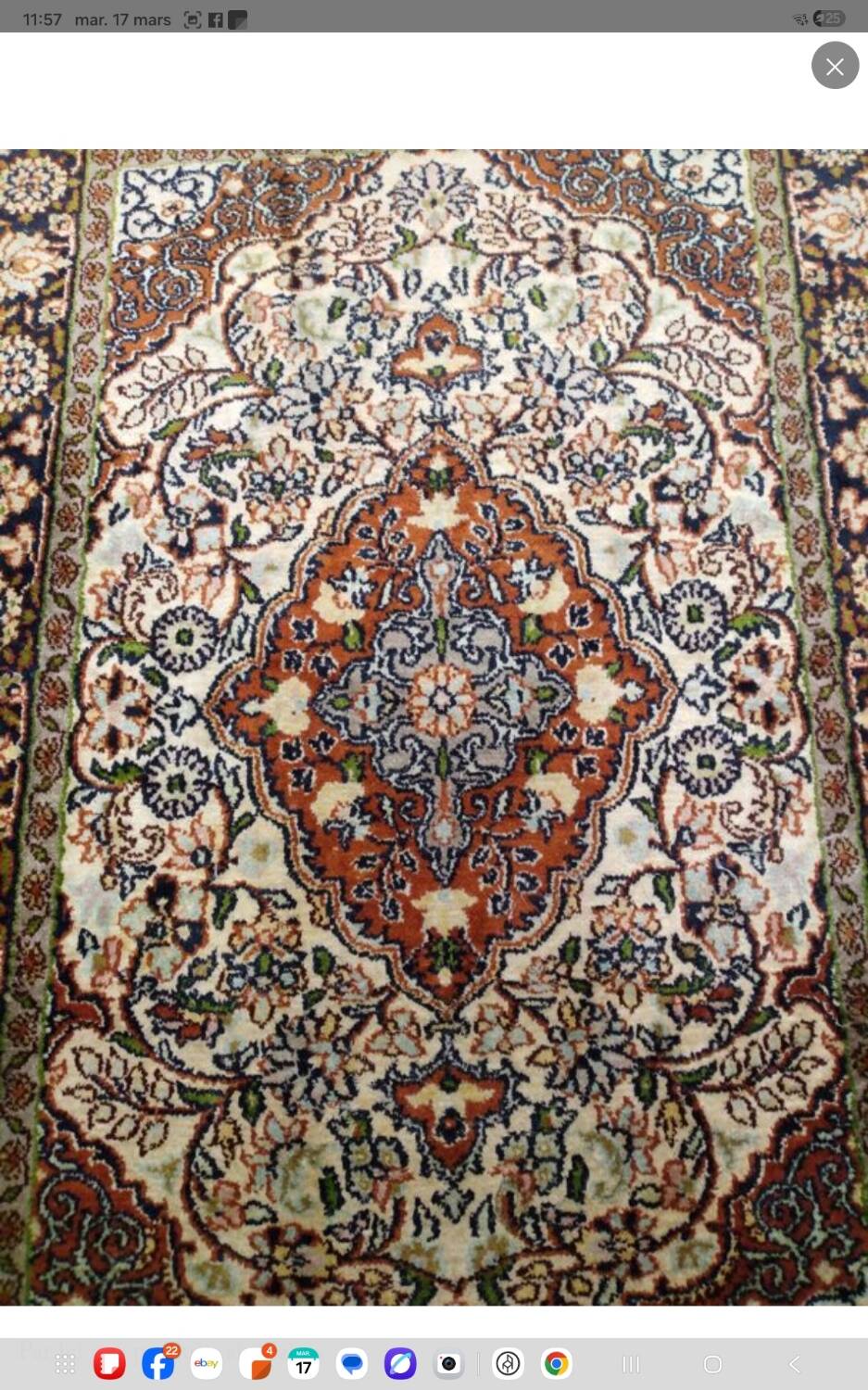 Handmade Persian carpet in wool and silk.