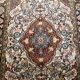 Handmade Persian carpet in wool and silk.