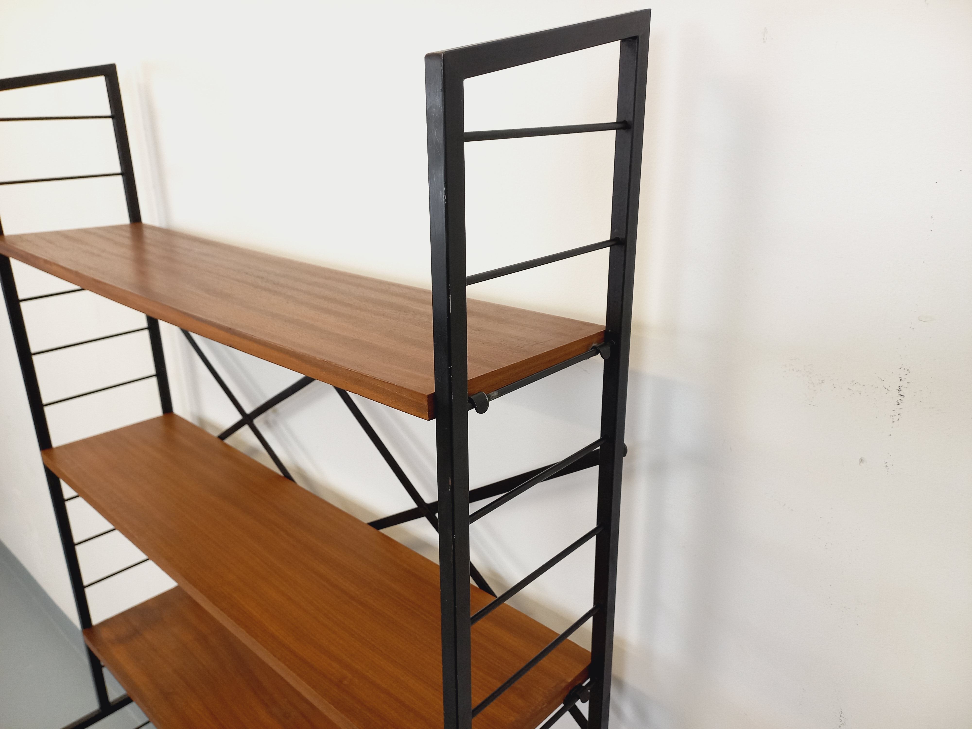 Vintage Italian bookshelf in teak and metal from the 1960s.