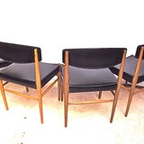 Four Scandinavian-style chairs