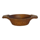 Gouged wooden pocket emptier