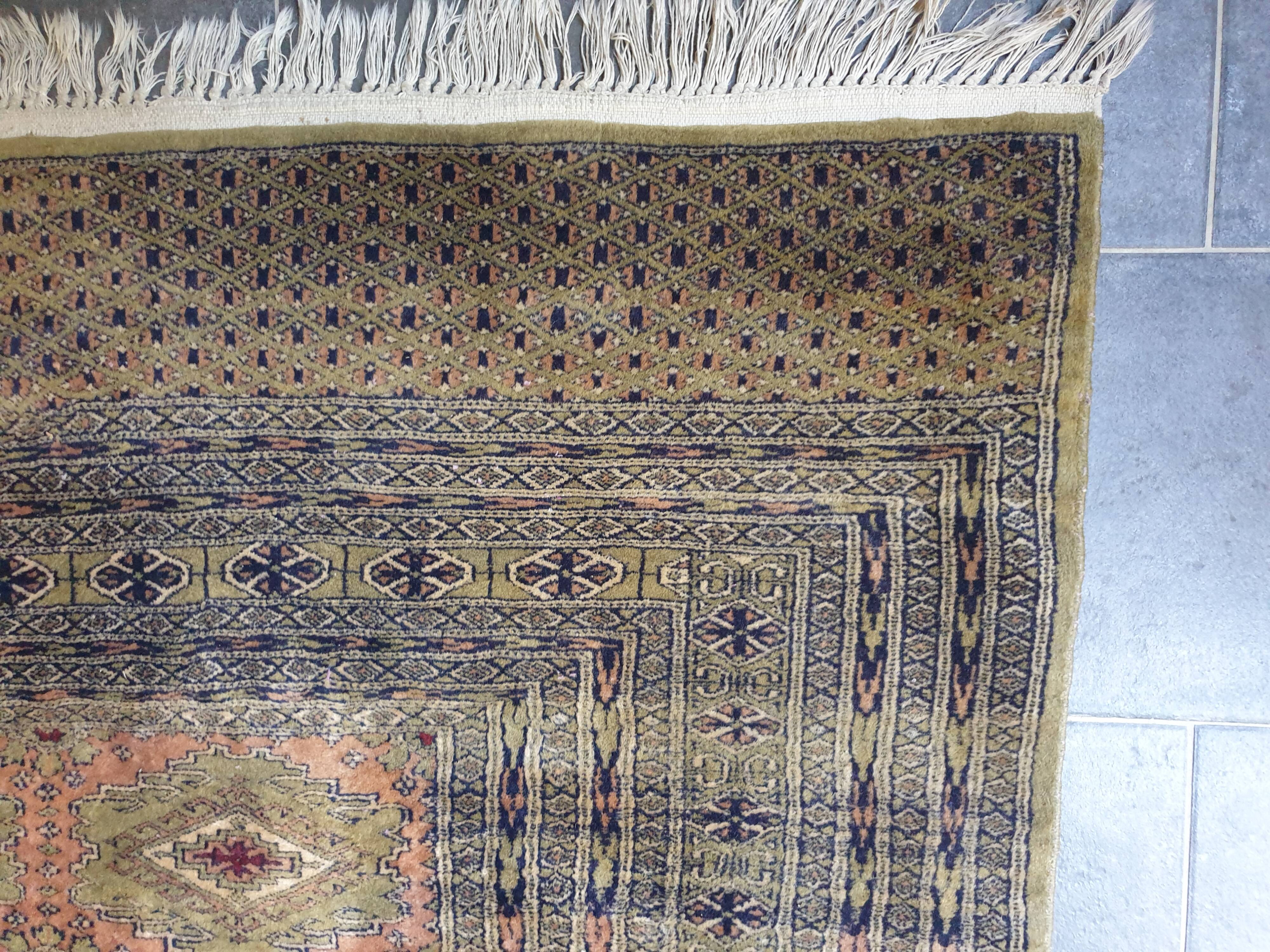 Hand-knotted silk rug 192x 300cm
