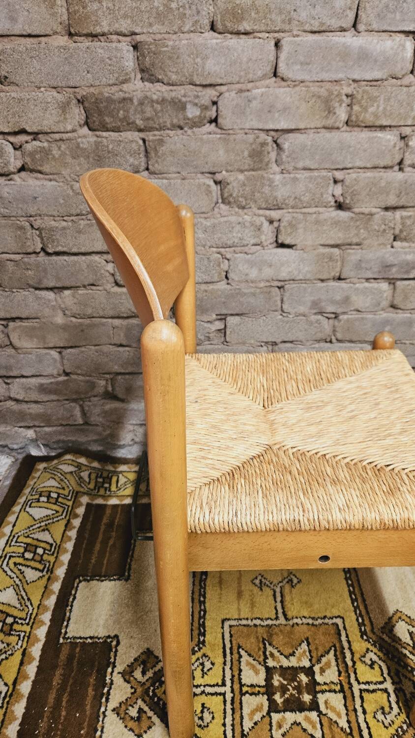 4 straw chairs in the vintage Charlotte Perriand 1970 style