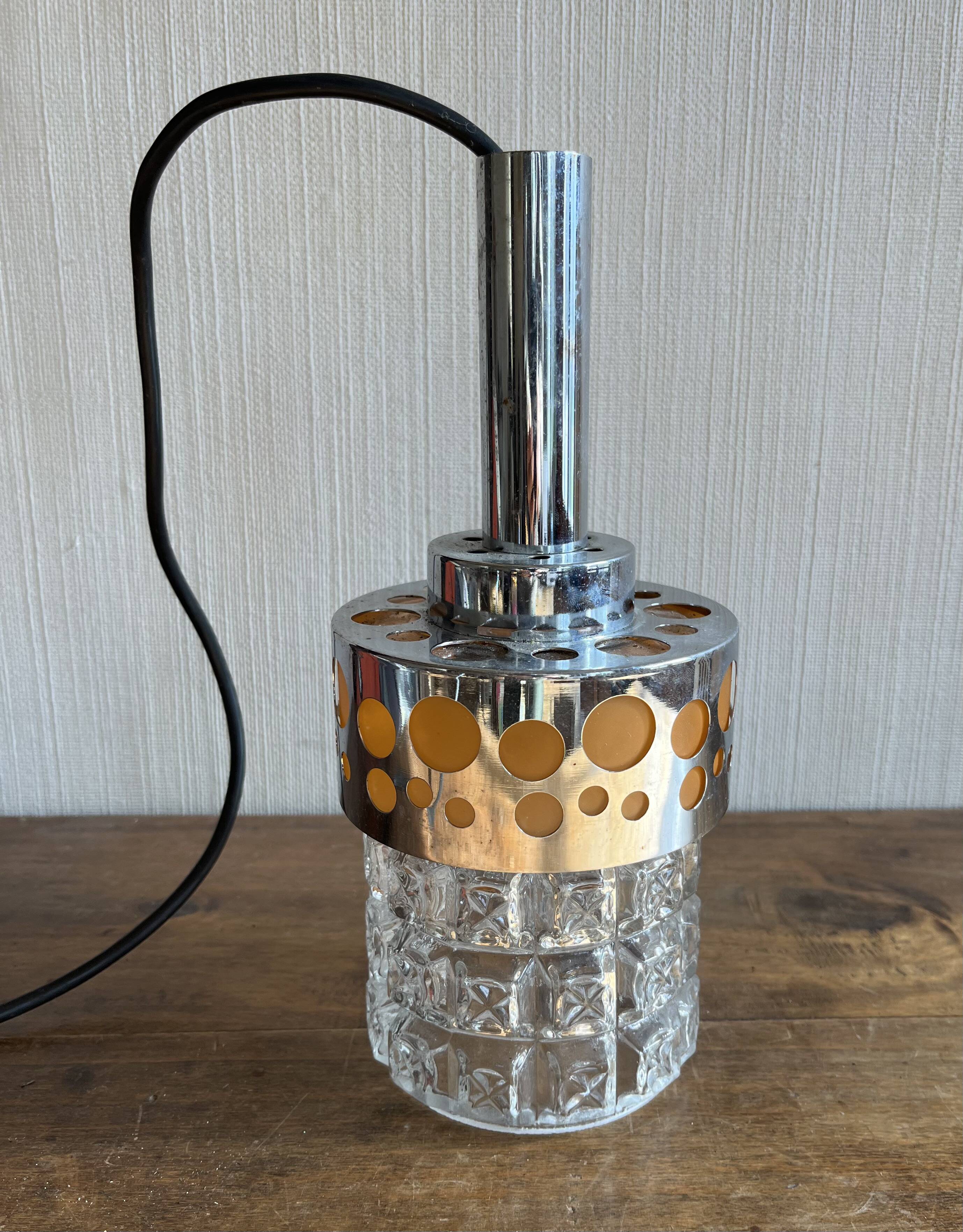 Small raak chrome and orange pendant light