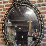 Ancien miroir ovale patiné noir et doré style louis xv