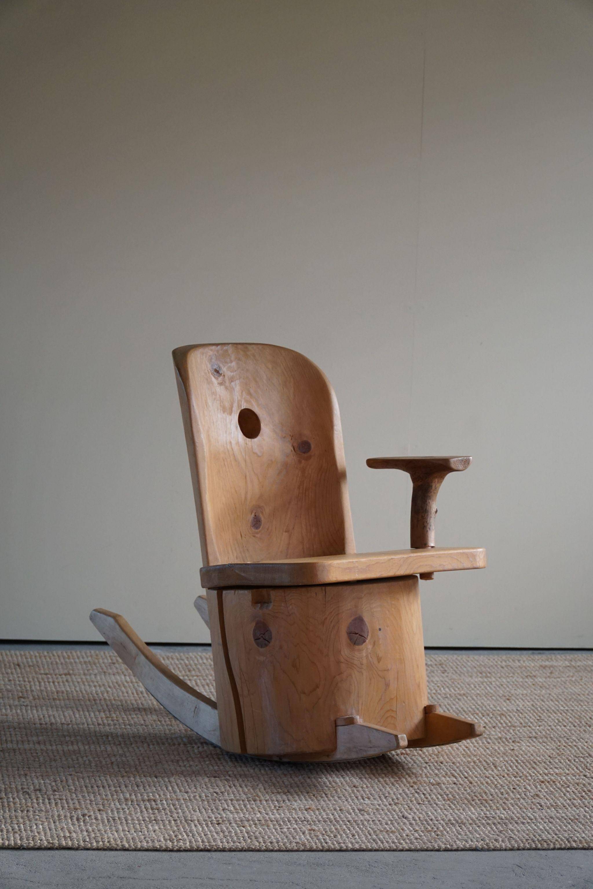 Unique sculptural rocking chair by the Finnish Matti Martikka in solid pine, 1960s.