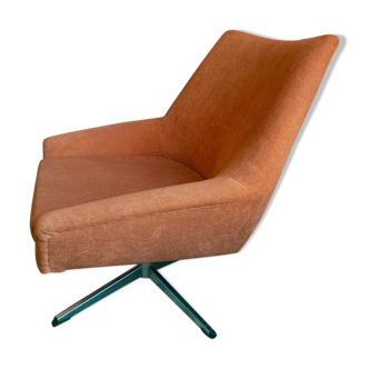 Orange swivel shell chair